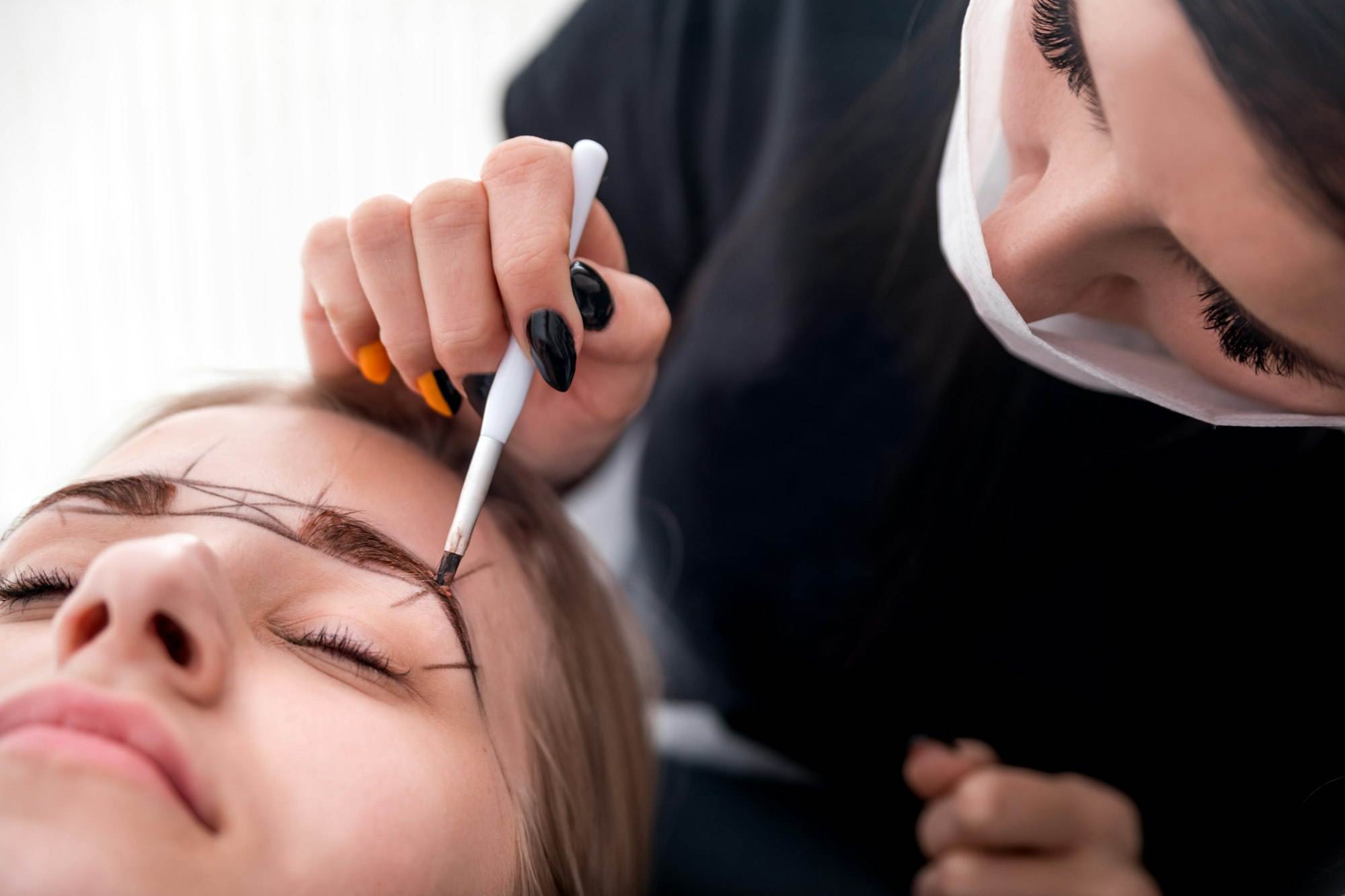 Permanent make up on eyebrows at beauty salon